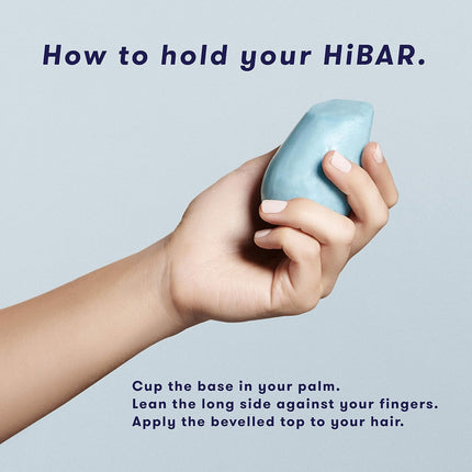 Hand holding a blue HiBAR with text on how to use it