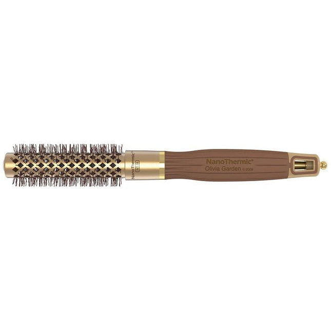 Close-up of the bristles on a Olivia Garden NanoThermic Round Thermal hair brush, showing a mix of black and brown bristles designed for hair styling.