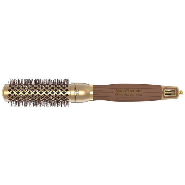 Close-up view of a round thermal hair brush with ceramic technology, featuring wavy heat-resistant bristles and a unique handle.